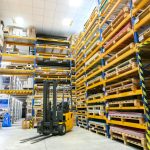 a-large-warehouse-filled-with-lots-of-pallets