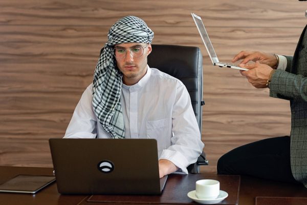 a-man-using-a-laptop-in-the-office