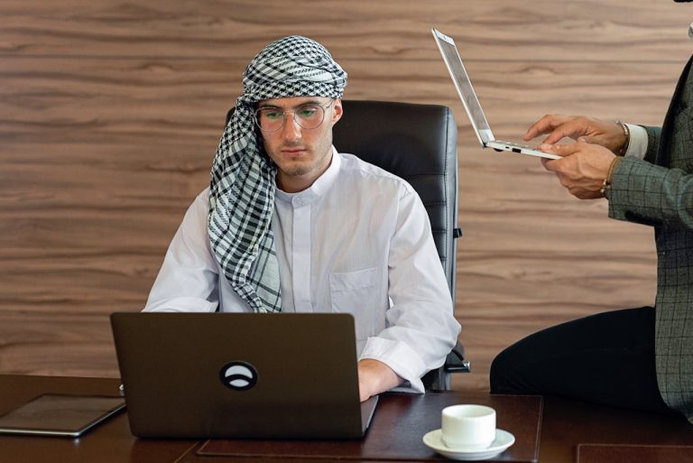 a-man-using-a-laptop-in-the-office